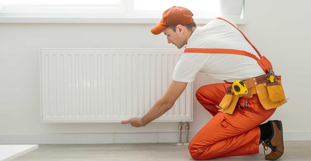 Montaż grzejnika w ramach systemu ogrzewania budynku